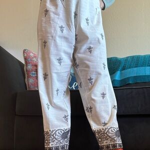 Limelight White Wide-Leg Printed Harem Pants with Black Motif